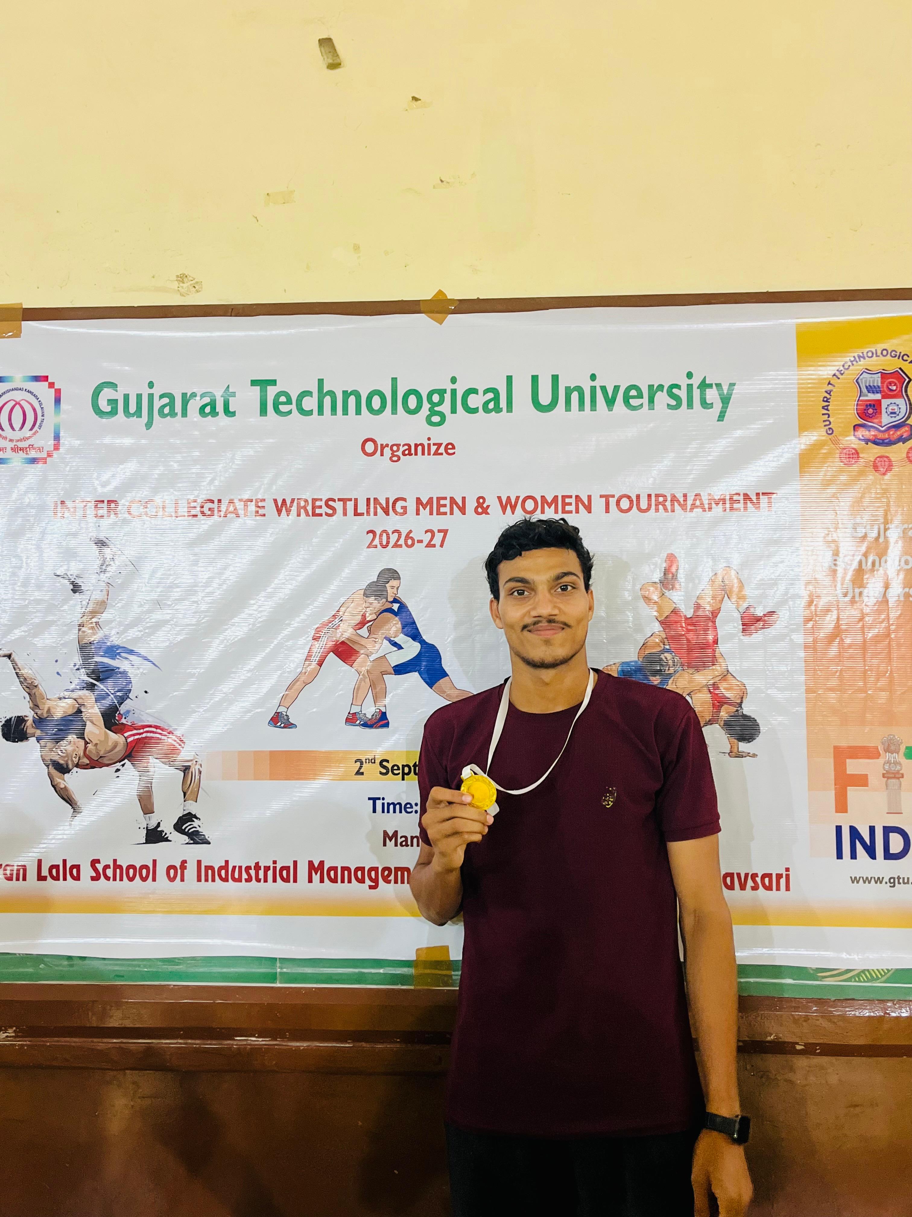 APMC Student Rahul Kumavat Wins Gold at GTU Inter-College Wrestling Competition Sep-2026