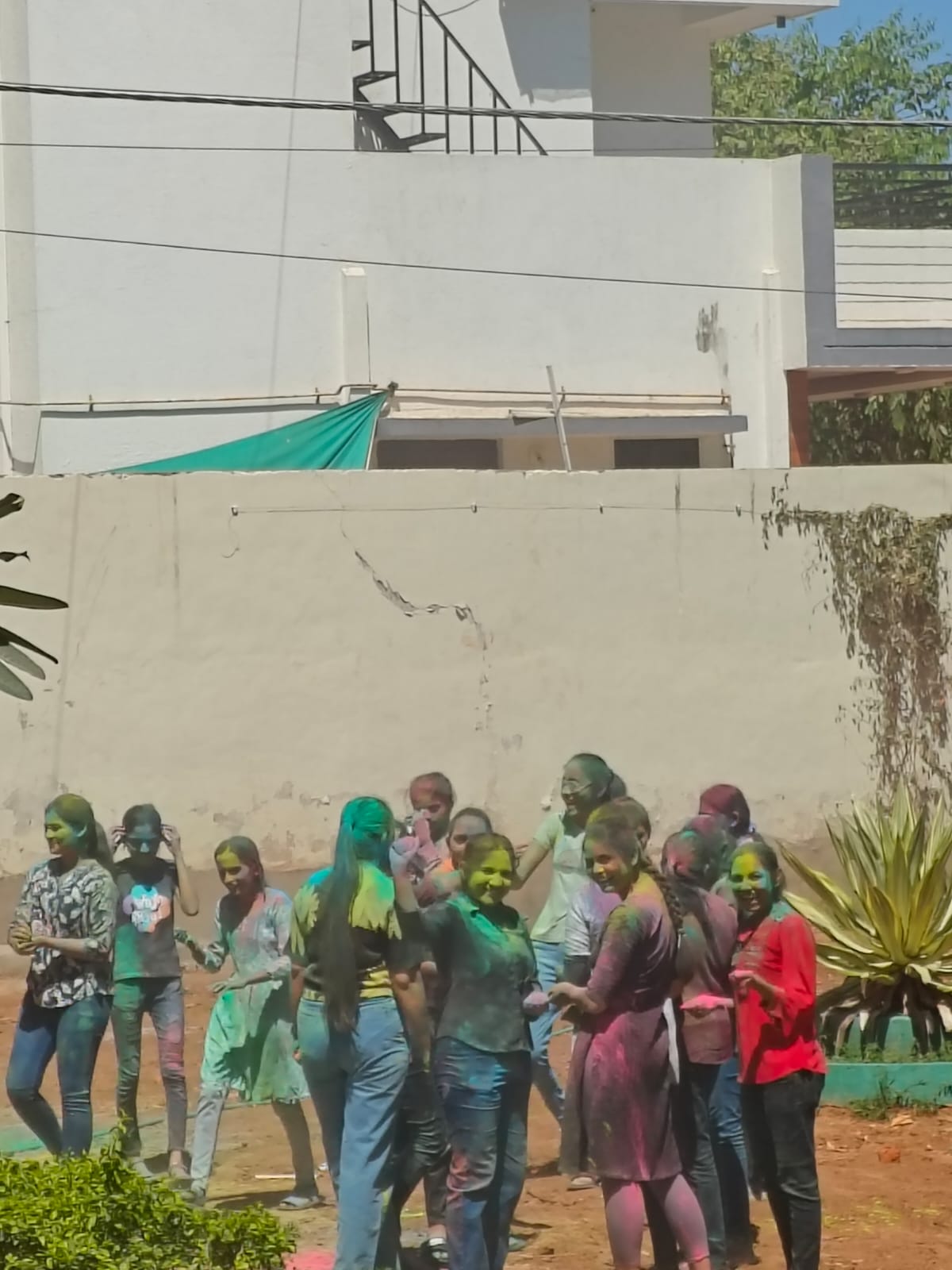 Holi celebration" in our campus. On 13 March 2025, 1:00 PM in our college premises.